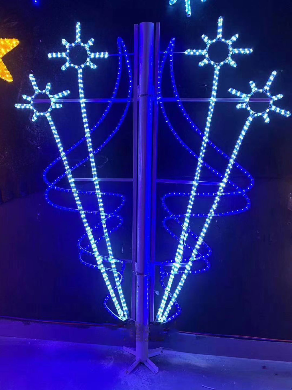 Outdoor blue white star swirl street pole LED motif light installed view