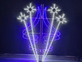 Outdoor blue white star swirl street pole LED motif light front view
