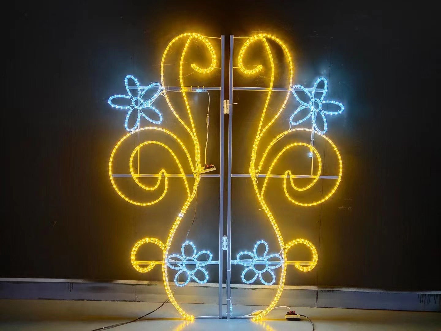 Outdoor gold floral scroll street pole LED motif light front view