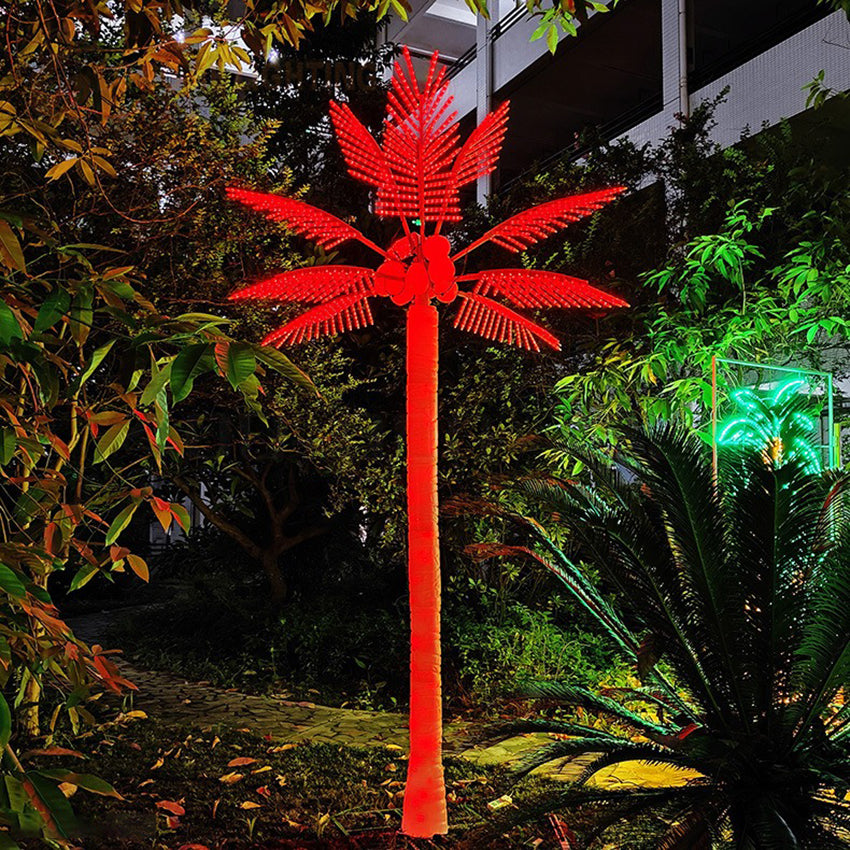 Red LED palm tree light outdoor display on black background, high-visibility decorative lighting