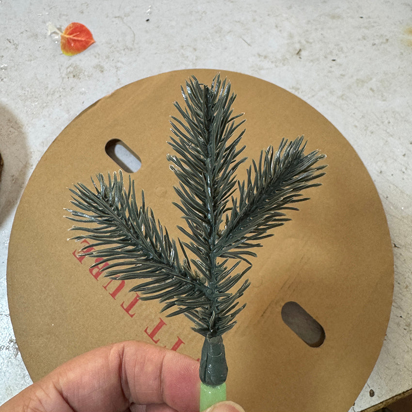 Green artificial pine needle sleeve for LED tree light assembly and repair