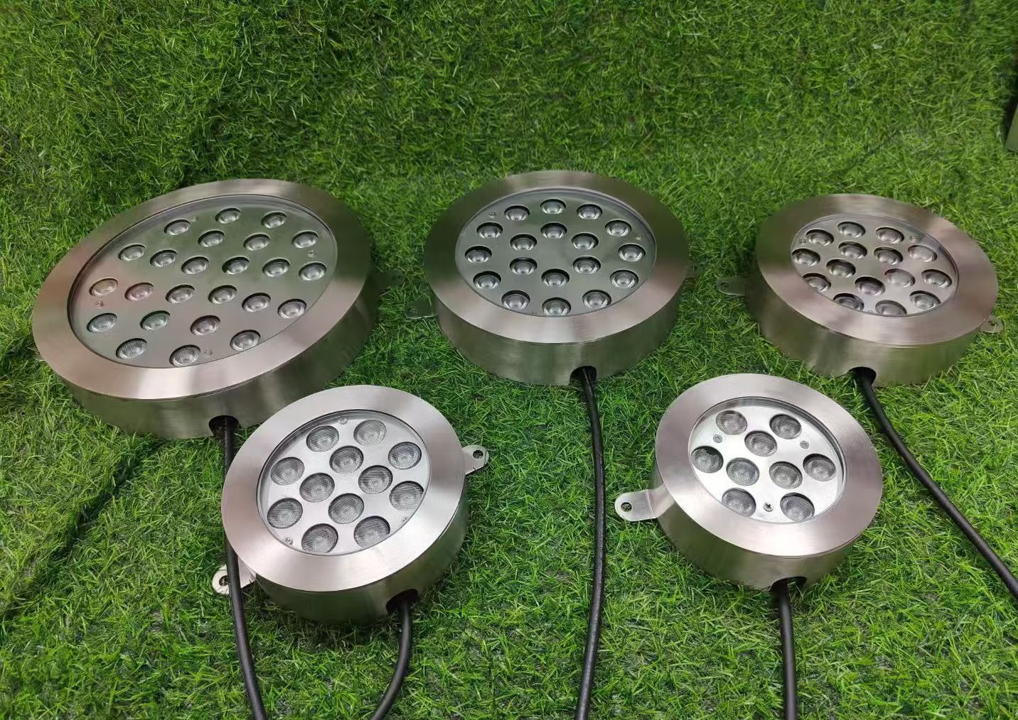 Pair of stainless steel underwater lights with cables