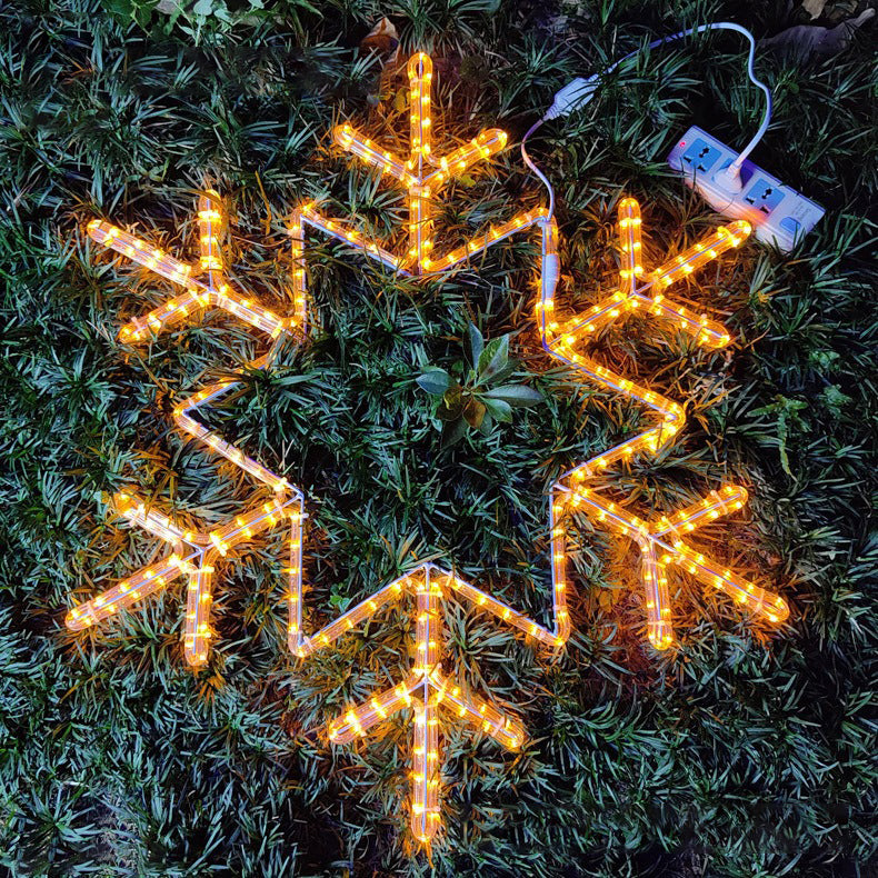 Multi-color LED snowflake motif light close-up for outdoor holiday decor