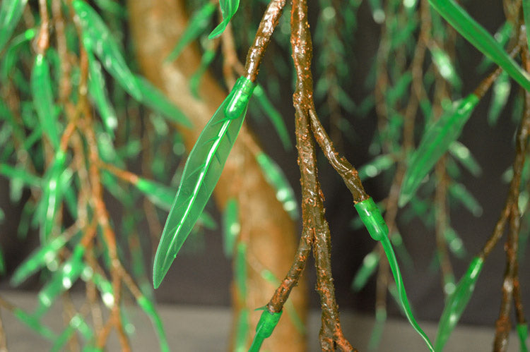 Close-up detail of green LED willow leaves and branches for app-controlled RGBW weeping willow tree light