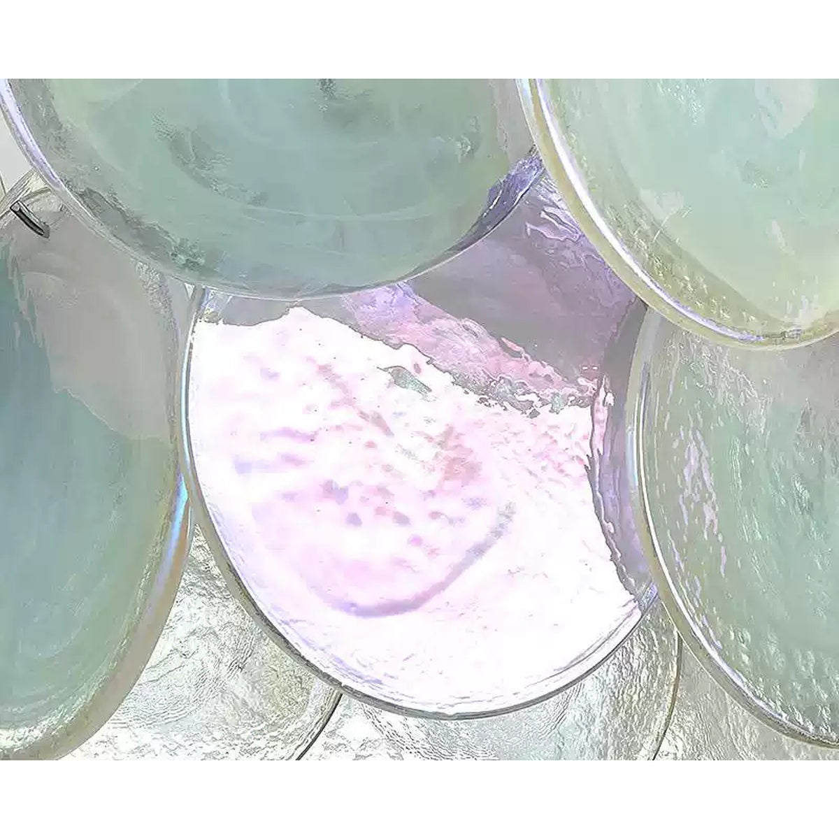 Colorful glass disc detail on modern chandelier