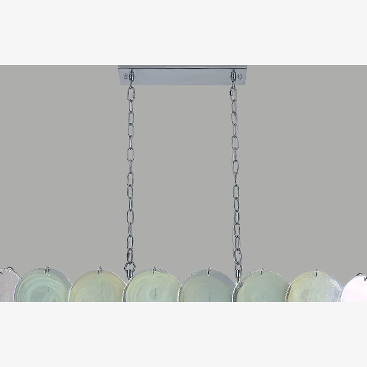 Colorful white glass disc chandelier with lights off