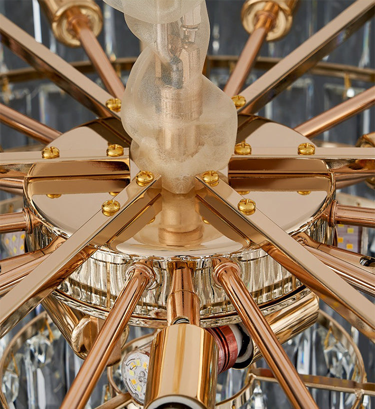 Gold frame and hardware detail of crystal chandelier