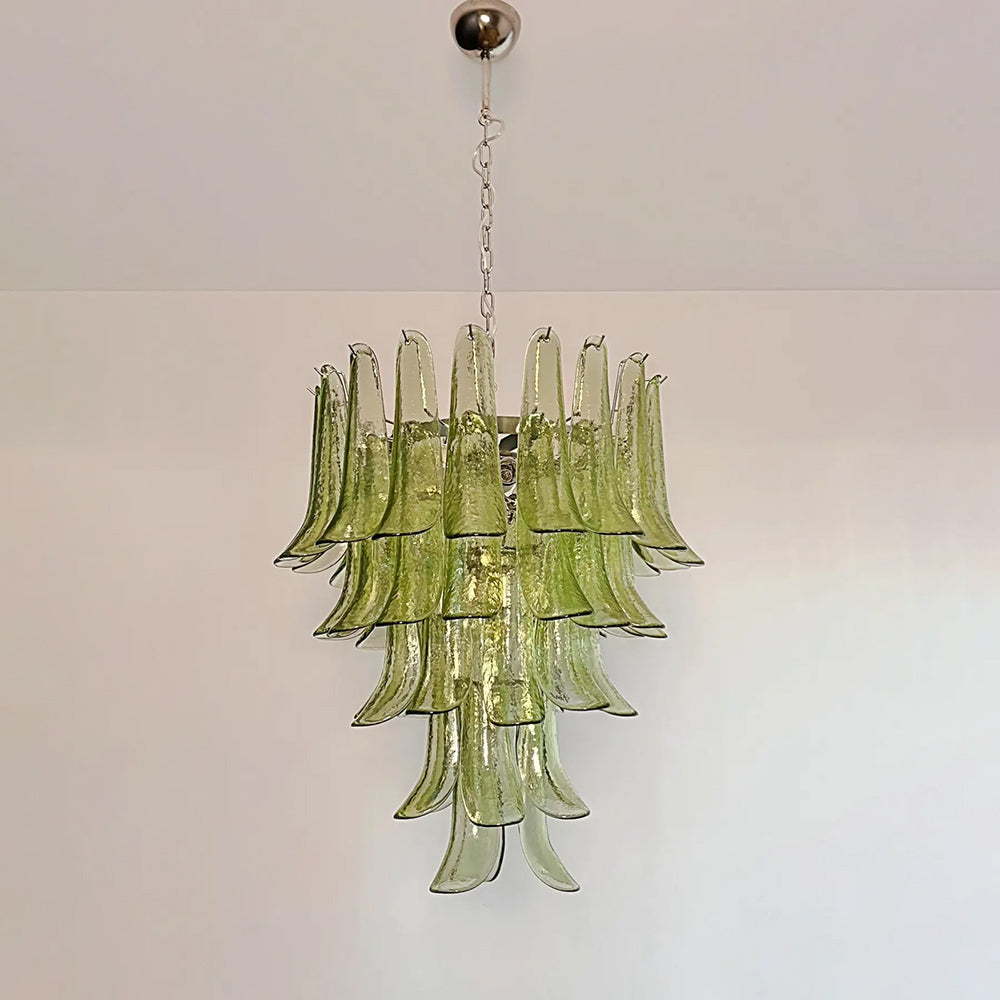 Green Murano glass petal chandelier hanging in luxury interior