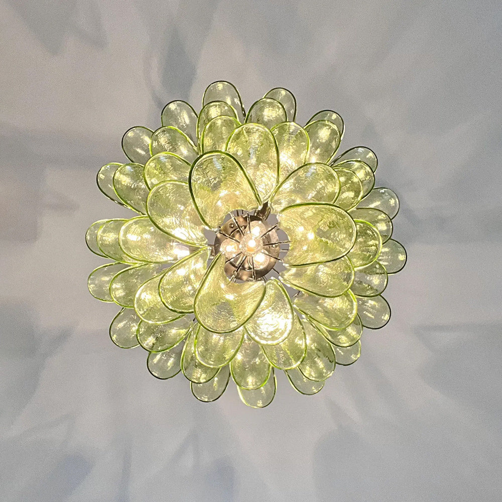 Green Murano glass petal chandelier hanging in luxury interior