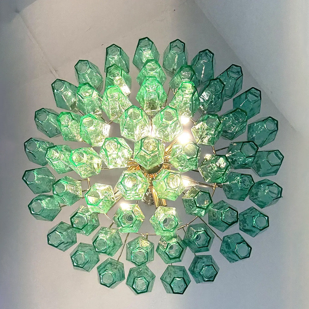 Close-up of green Poliedri Murano glass pieces on chandelier