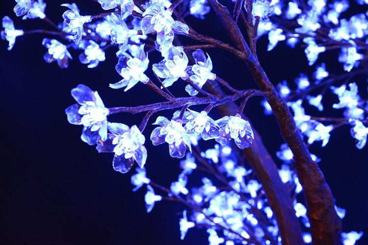 Control system detail for cherry blossom tree light: standard remote control, DMX available as a customization option