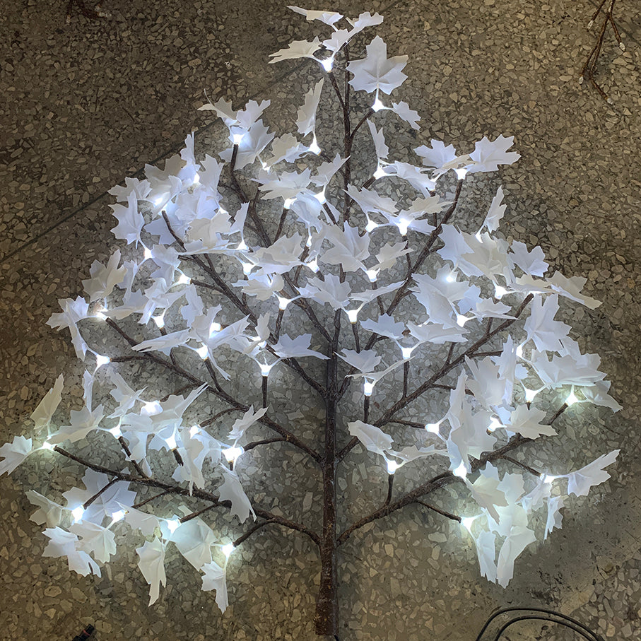 Close-up of simulation trunk texture with resin coating on stainless steel pipe frame for LED maple tree light