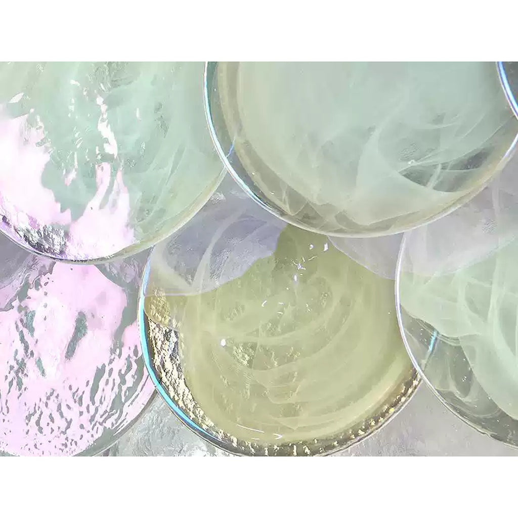 Close-up of handblown colorful glass discs on chandelier
