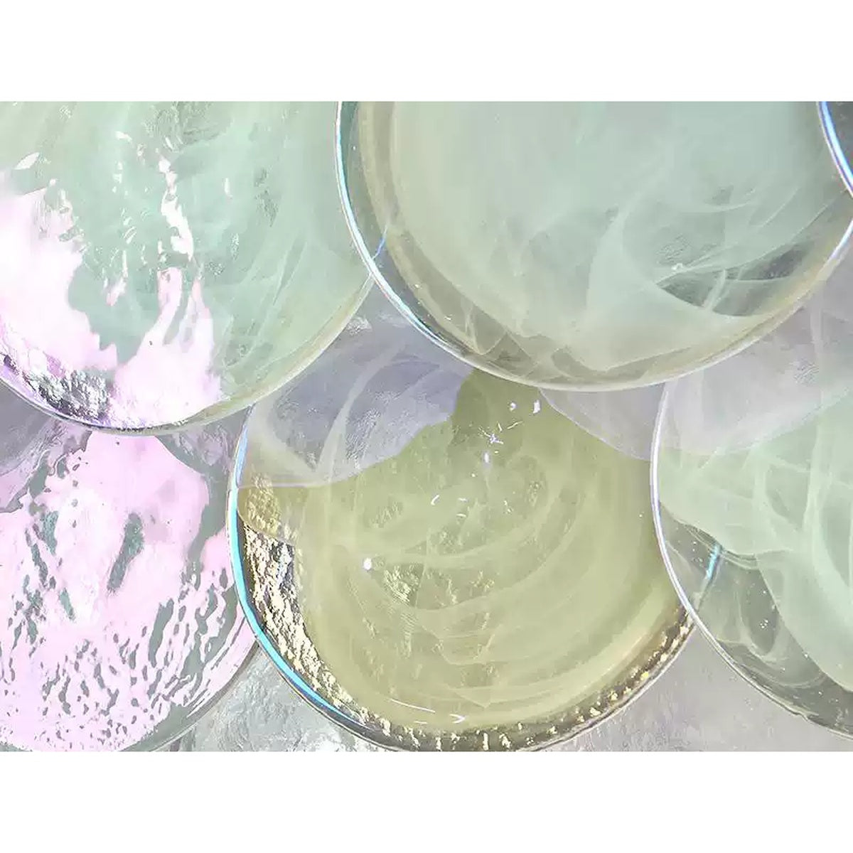 Close-up of handblown colorful glass discs on chandelier