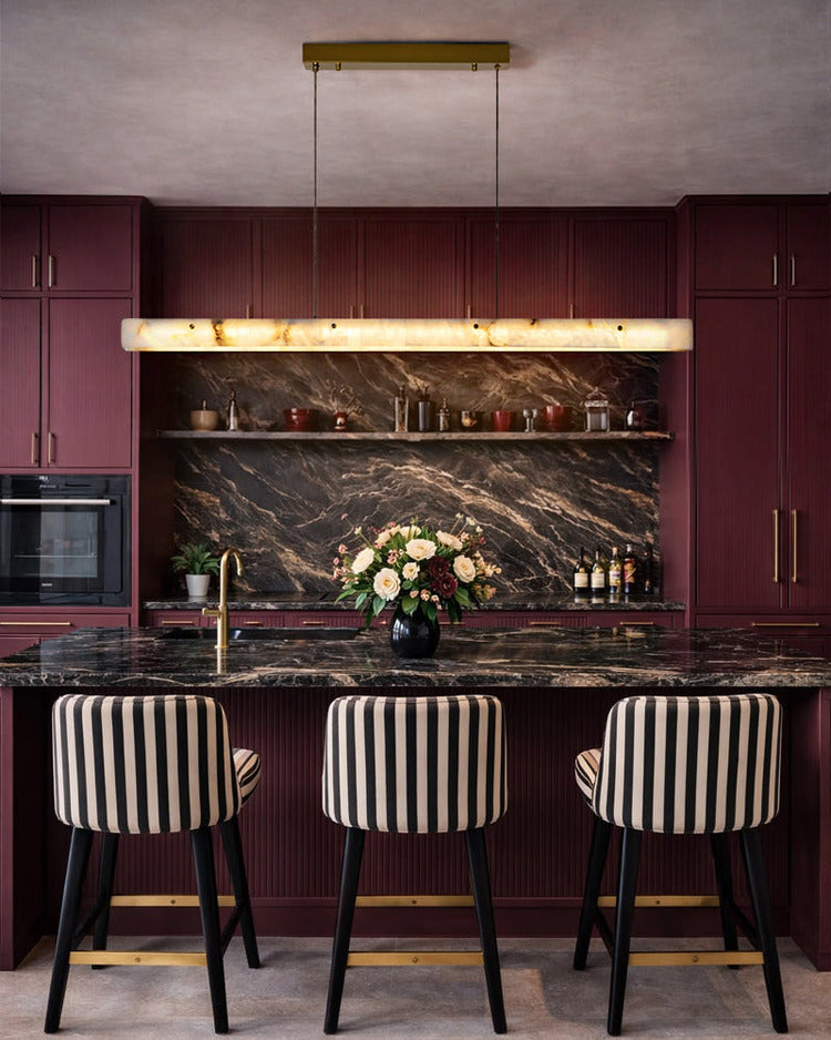 Natural stone linear pendant light in dark modern kitchen