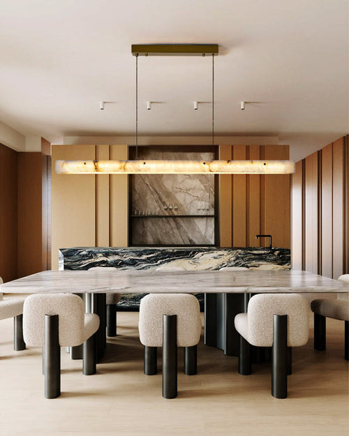 Natural stone linear alabaster pendant light above a modern kitchen island