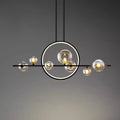 Nordic glass ball chandelier hanging above dining table in modern interior