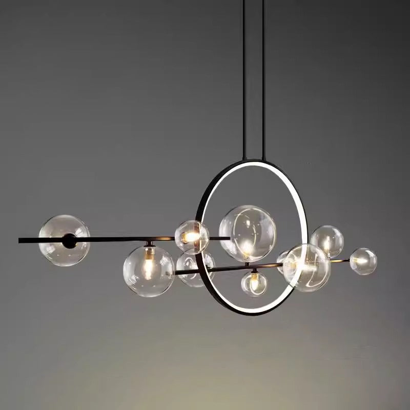Nordic glass ball chandelier hanging above dining table in modern interior