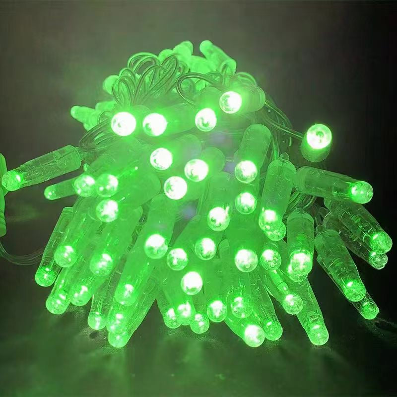 Green PVC LED string light close up with clear wire
