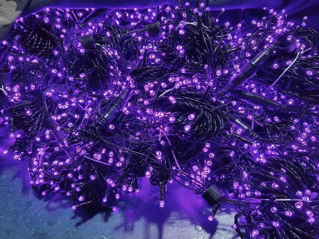 Purple PVC LED string lights with black wire and waterproof connectors