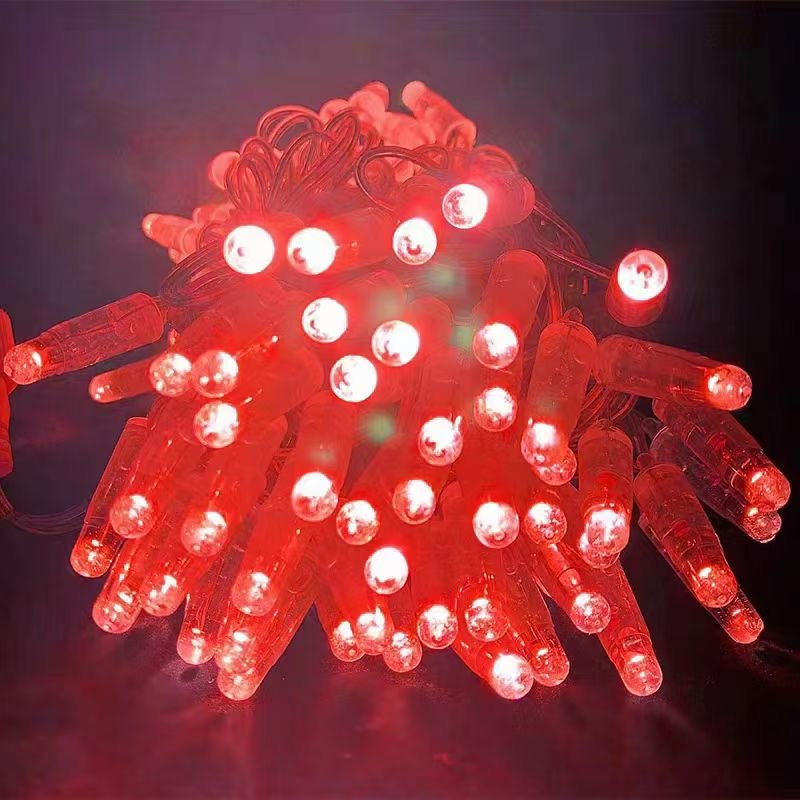 Red PVC LED string light close up with clear wire