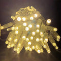 Warm white PVC LED string light close up with clear wire