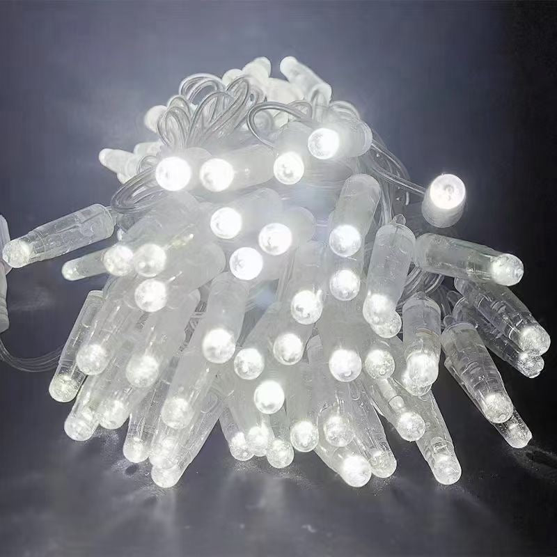 White PVC LED string light close up with clear wire