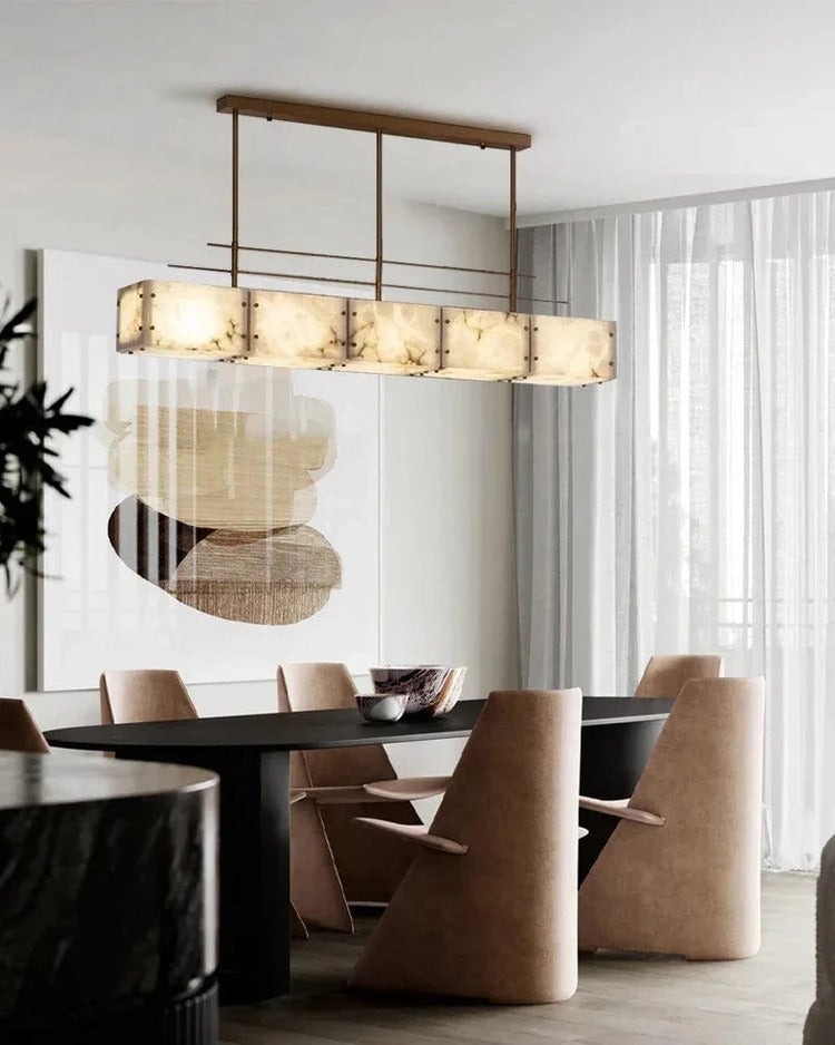 Rectangular alabaster brass chandelier lighting over dining table