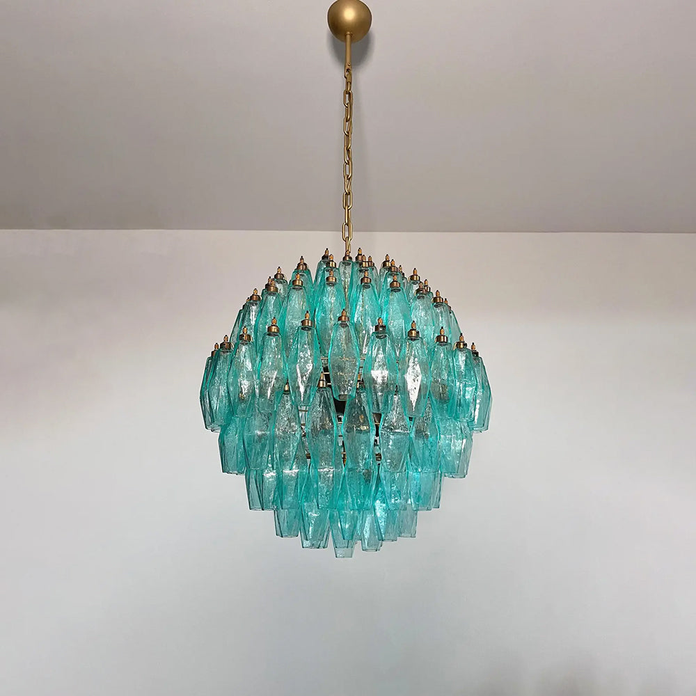 Turquoise Murano style poliedri chandelier hanging in luxury interior