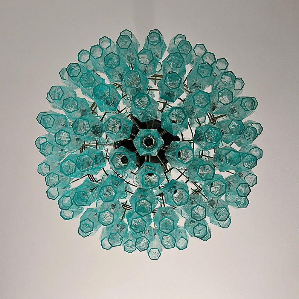 Close-up of turquoise Murano style glass pieces on chandelier