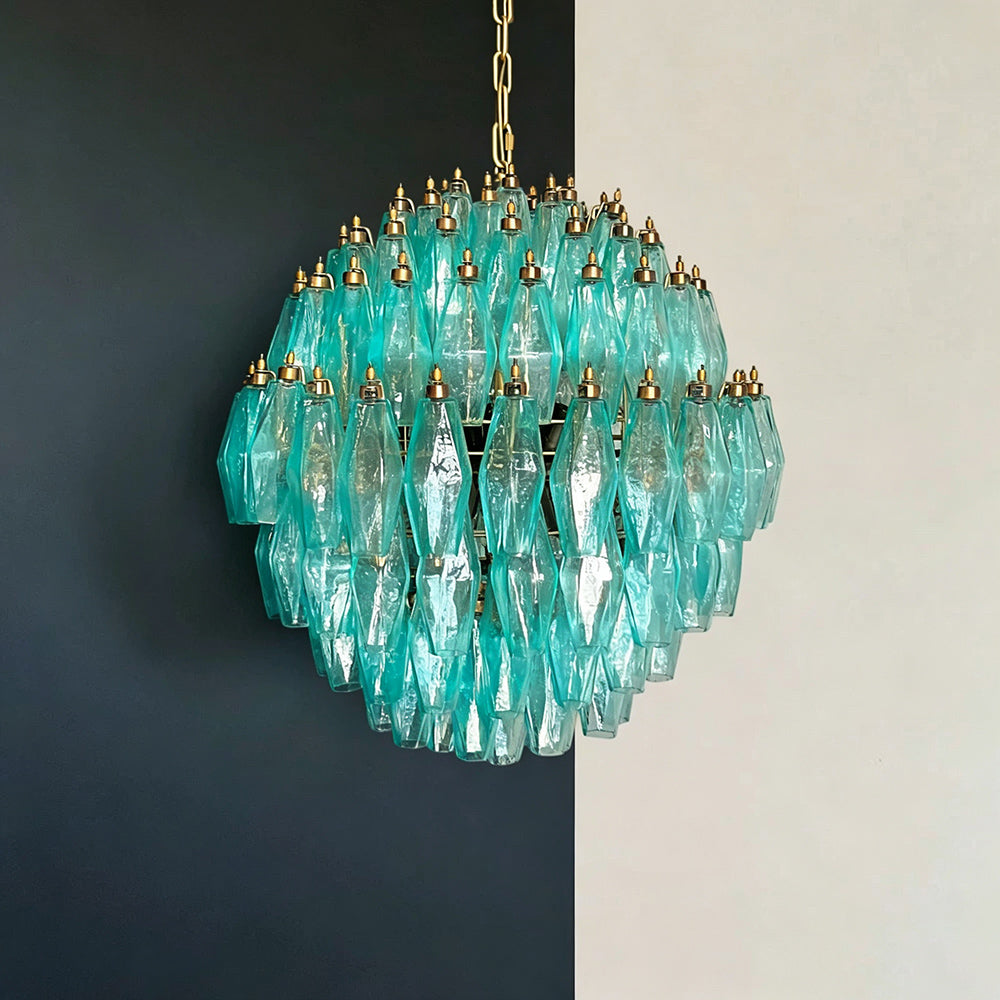 Close-up of turquoise Murano style glass pieces on chandelier